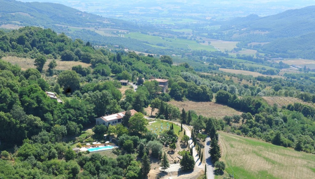 View of green hillside and the houses on the Casa Nova estate