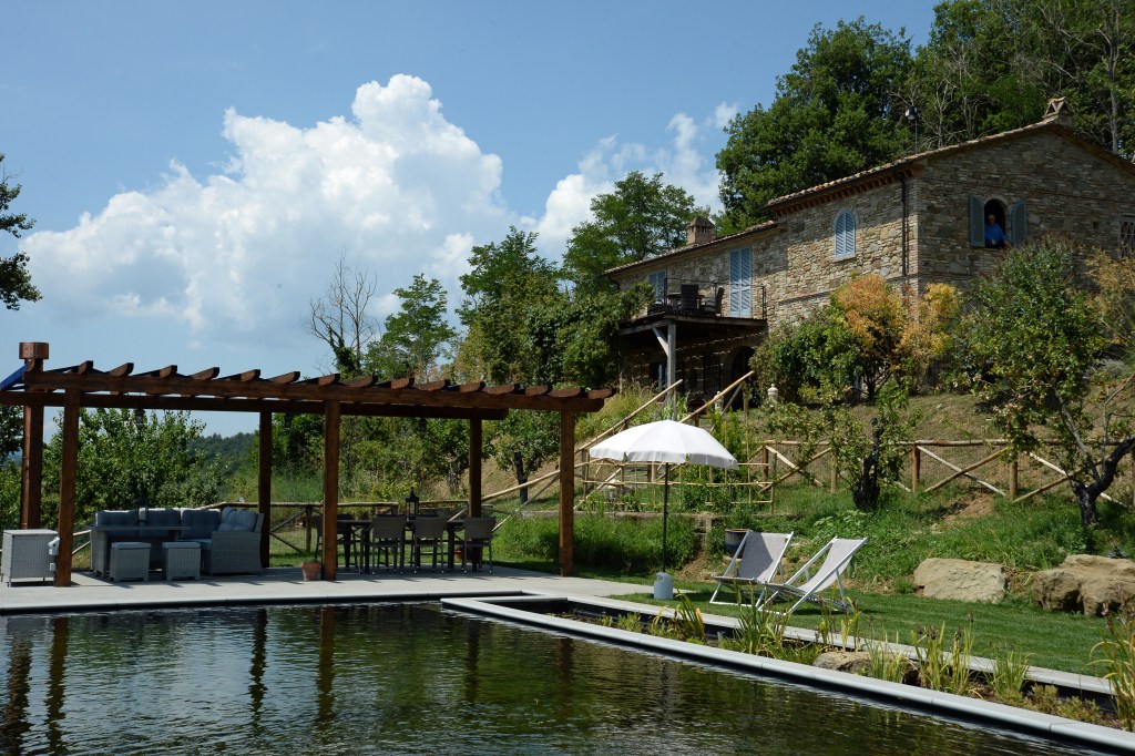 View of Casa dell'Ortolano and bio-pool
